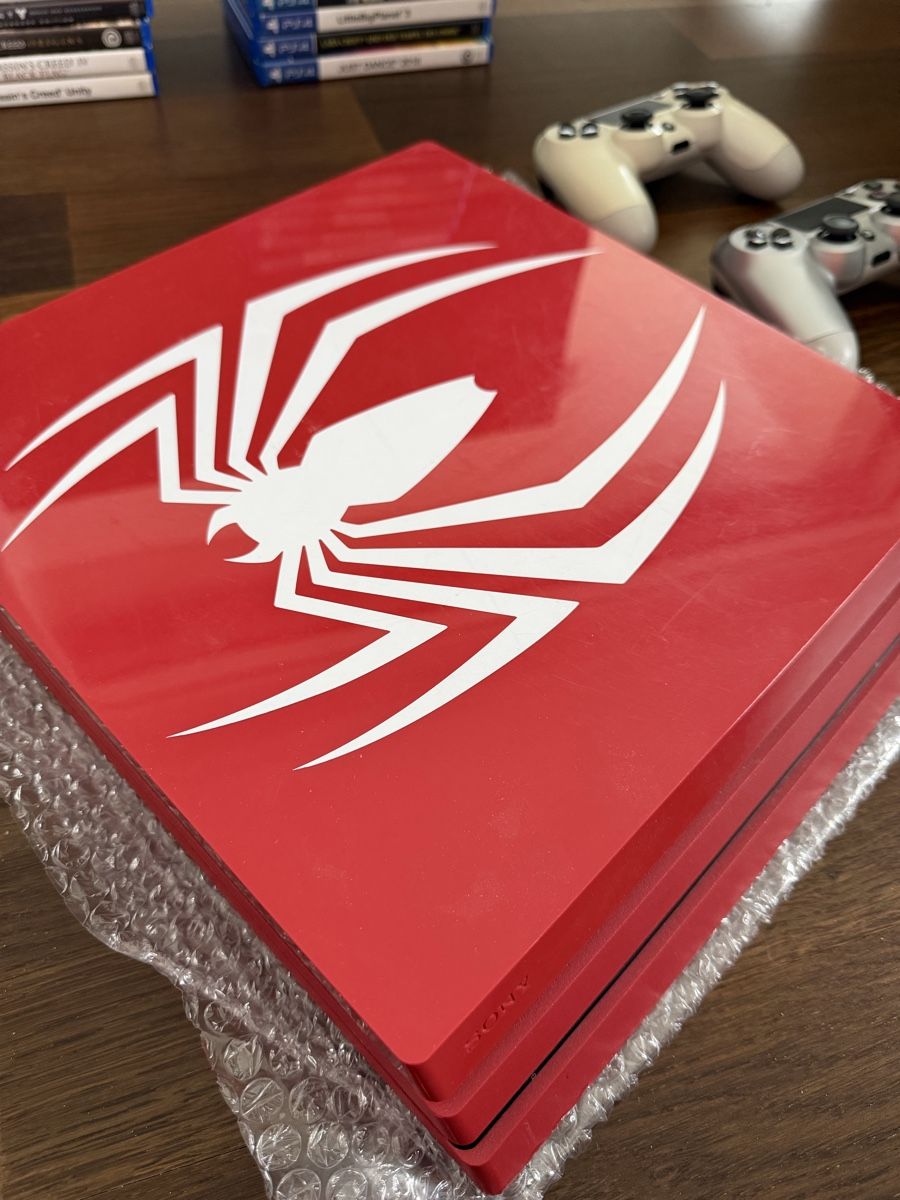 Sony Konsolen: PlayStation 4 Pro Spiderman Edition + 33 games + 2 controlle – Gebraucht aus Kloten von Friendly_Collector 1