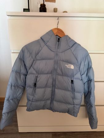 Doudoune The North Face bleue à capuche état correct