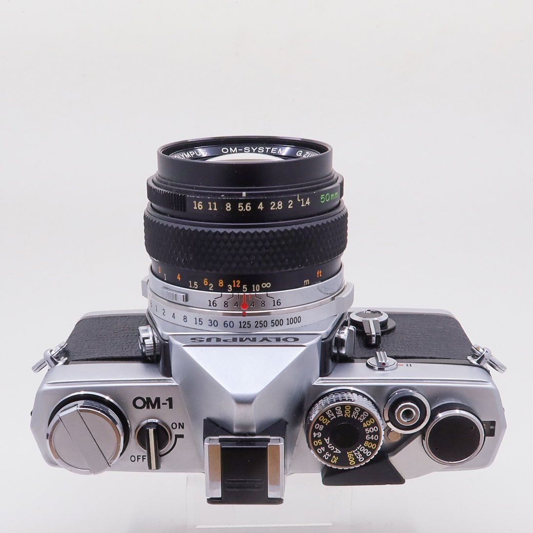 Olympus Fotocamera: Olympus OM-1 mit 50mm f1,4 – Usato da Luzern venduto da AMS144 2