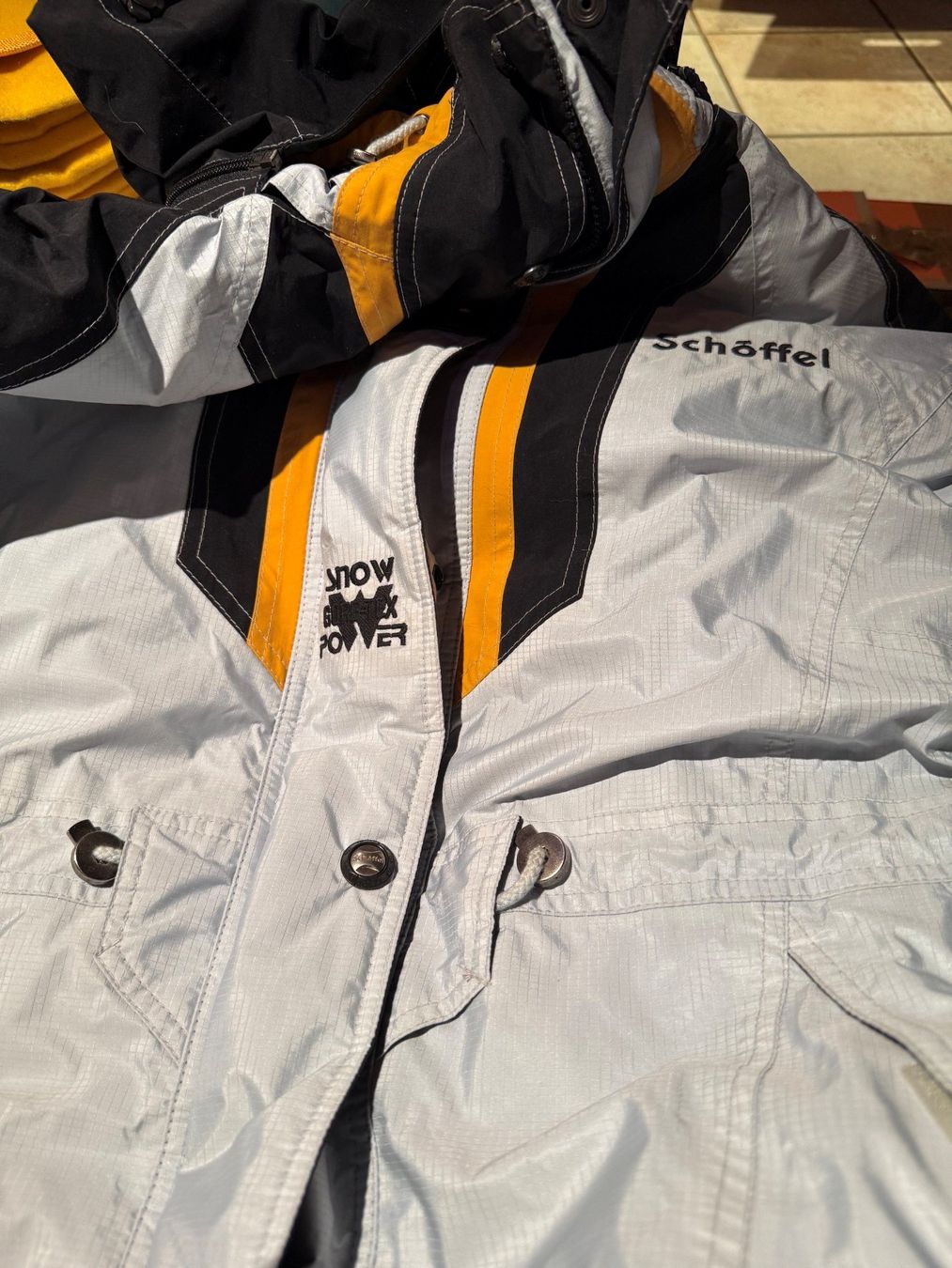 Schoeffel Giacche: Veste Schöffel Taille M argent et jaune – Usato da Champéry venduto da Madodusud358