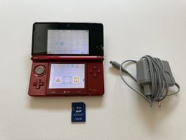 New Nintendo 3DS rouge avec chargeur et carte 2GB