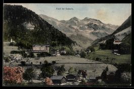 AK Flüeli, Dorfansicht mit Hotel, Kirche und Bergen