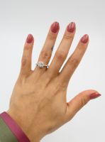 SOLITÄR RING IN 950 PLATIN MIT DIAMANT ENTOURAGE