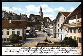 AK Burgdorf, Strasse mit Kirche und Brunnen