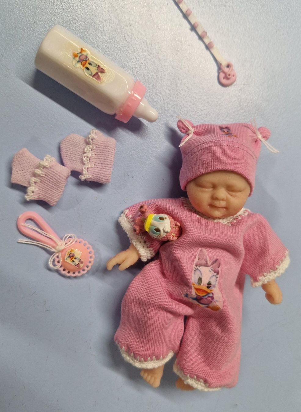 Bambole: Mini bébé en silicone  12 cm Thème DAISY  NEUF – Nuovo e nell'imballaggio originale da St-Imier venduto da goodber 2