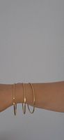 Elegante goldfarbene Armreifen (3er Set)