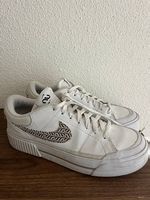 Nike Sneakers / Sportschuhe 40.5 weiss/gold
