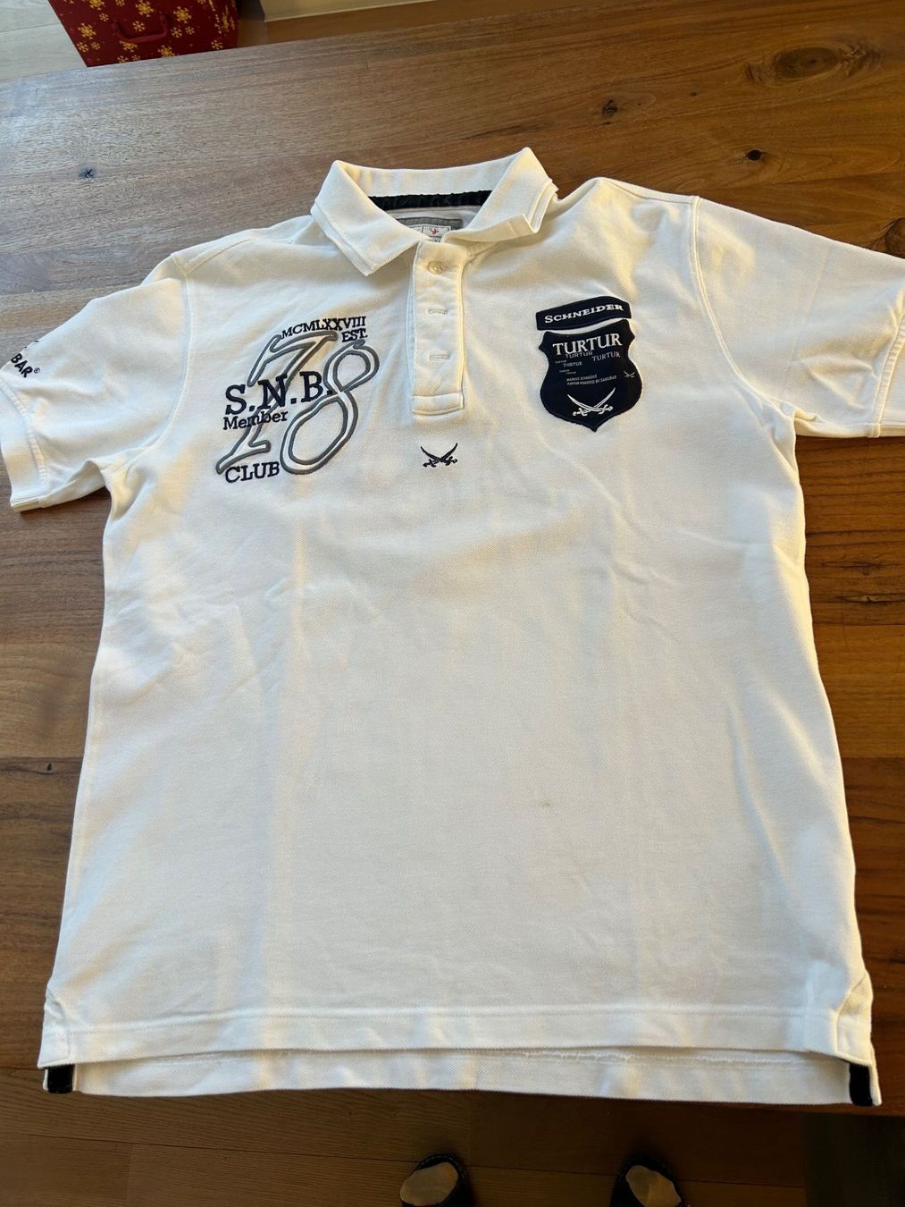 Magliette Polo: Poloshirt von Sansibar – Usato da Arbon venduto da Bulgari2011
