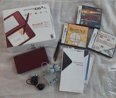 Nintendo DSi XL Bordeaux-Rot (US-Version) + 3 Spiele
