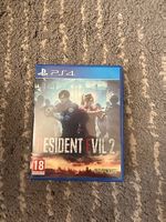 Resident Evil 2 Remake PS4  comme neuf, complet