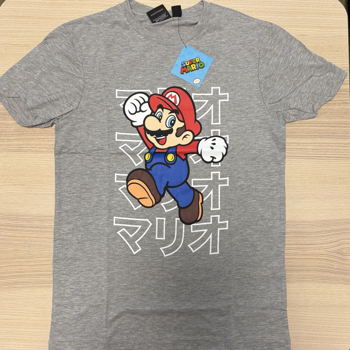T-shirt: Super Mario T-Shirt (Größe M) – Nuovo e nell'imballaggio originale da Mollis venduto da GamingCorner