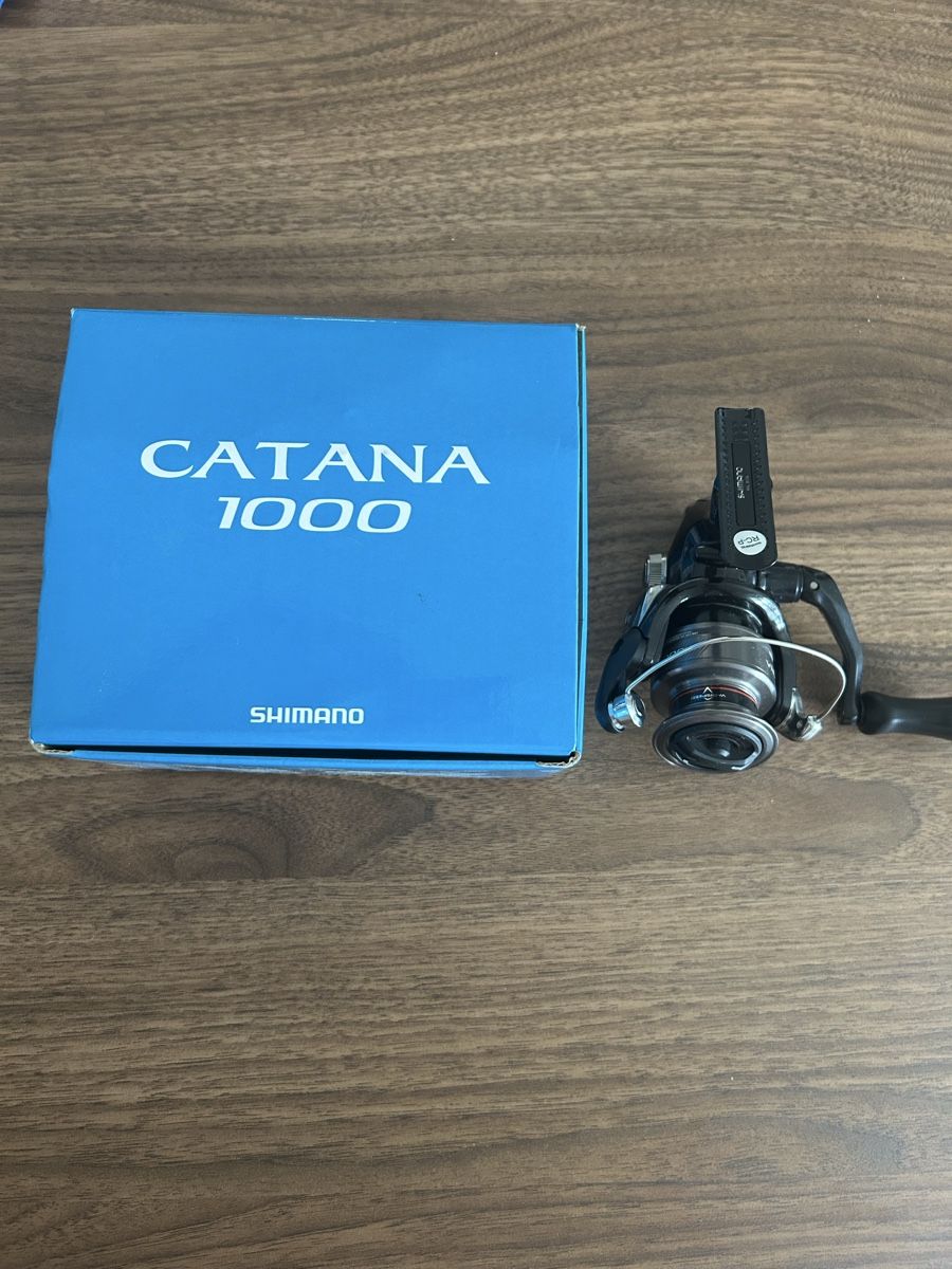 Shimano Tamburi & Mulinelli: Shimano Catana 1000 – Nuovo e nell'imballaggio originale da Luzern venduto da ITnoah
