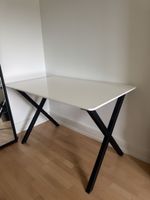 White desk with black metal legs