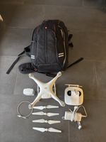 DJI Phantom 4 Drohne mit Rucksack und Zubehoer guter Zustand