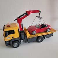 Bruder MAN Abschleppwagen mit Sportwagen (Roadster)