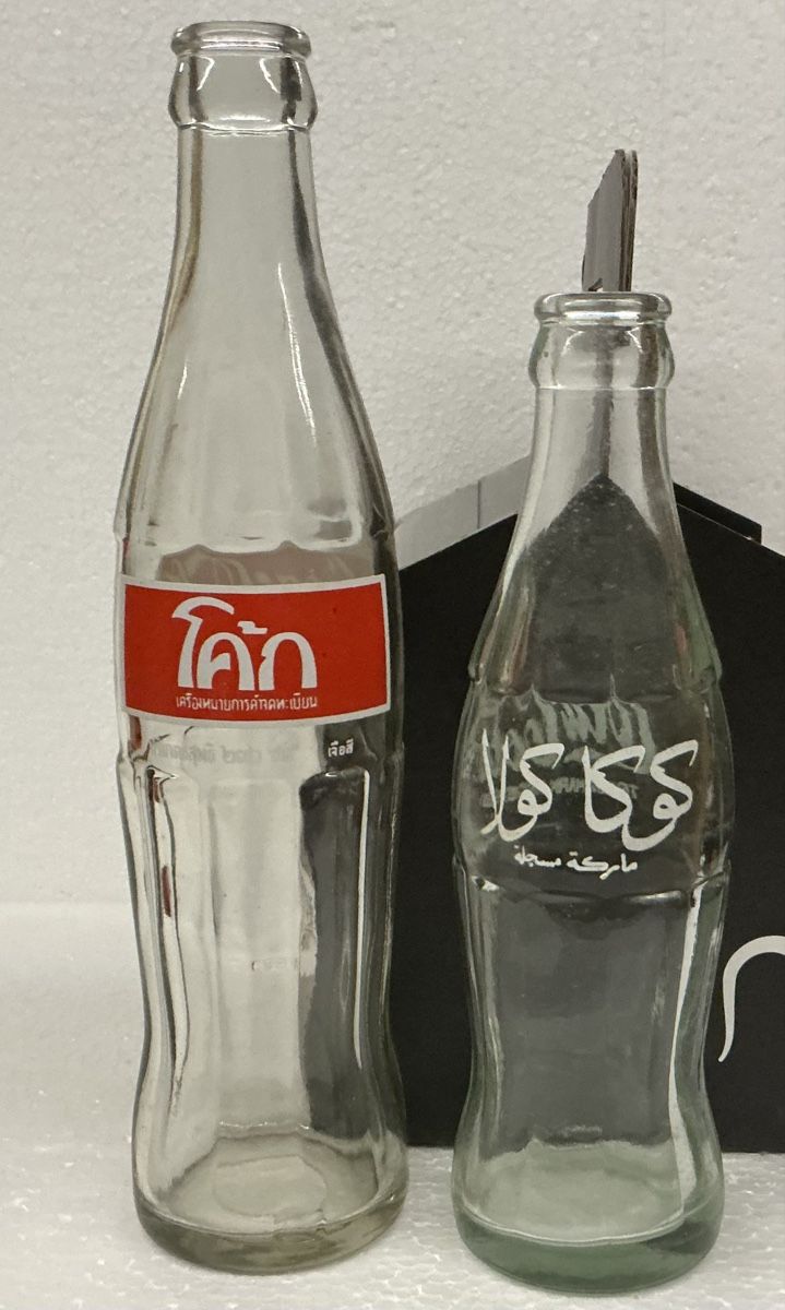 Coca-Cola Altro in Stoviglie & Bicchieri: Coca Cola/ Thailand und Egypt Flaschen – Usato da Arcegno venduto da Denni
