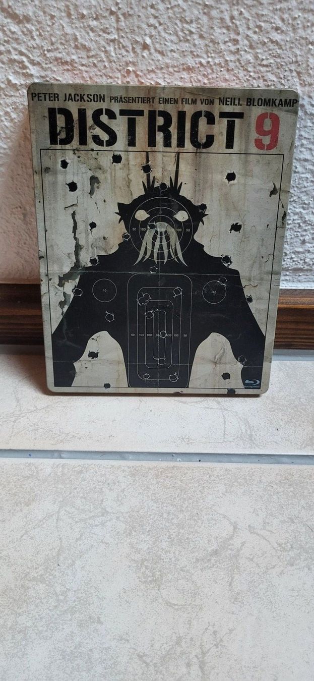 Alle DVDs: Blu-ray – District 9 Steelbook – Gebraucht aus Münsingen von Heroism2010