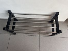 Lightly used black and metal shoe rack