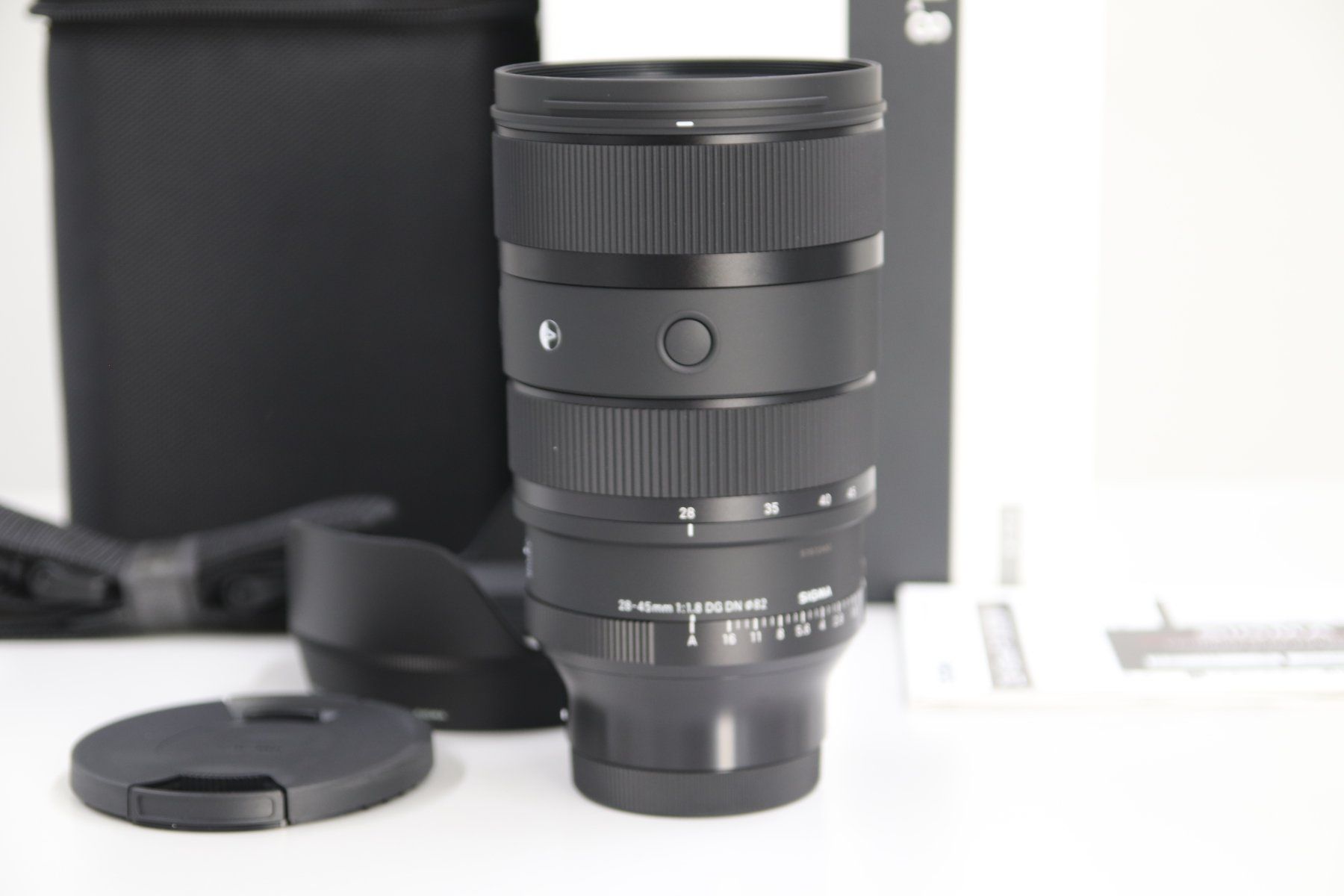 Sigma Objektive: Sigma 28-45mm 1.8 DG DN Sony E-Mount / NEU – Neu und originalverpackt aus Zofingen von OWYSSAG 1