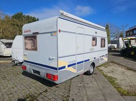 A vendre Dethleffs Camper, année 2004, avec store