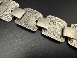 Vintage silberfarbenes Armband mit Münze