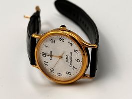 Montre publicitaire Canon damme dorée