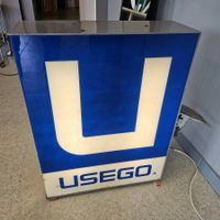USEGO Leuchtreklame Lightbox Schweizer Ladenkette Leuchte