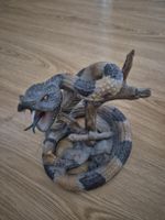Figurine serpent sur branche état neuf