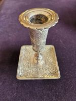 Bougeoir perse en métal argenté H. 14.5 cm.  Finement ciselé