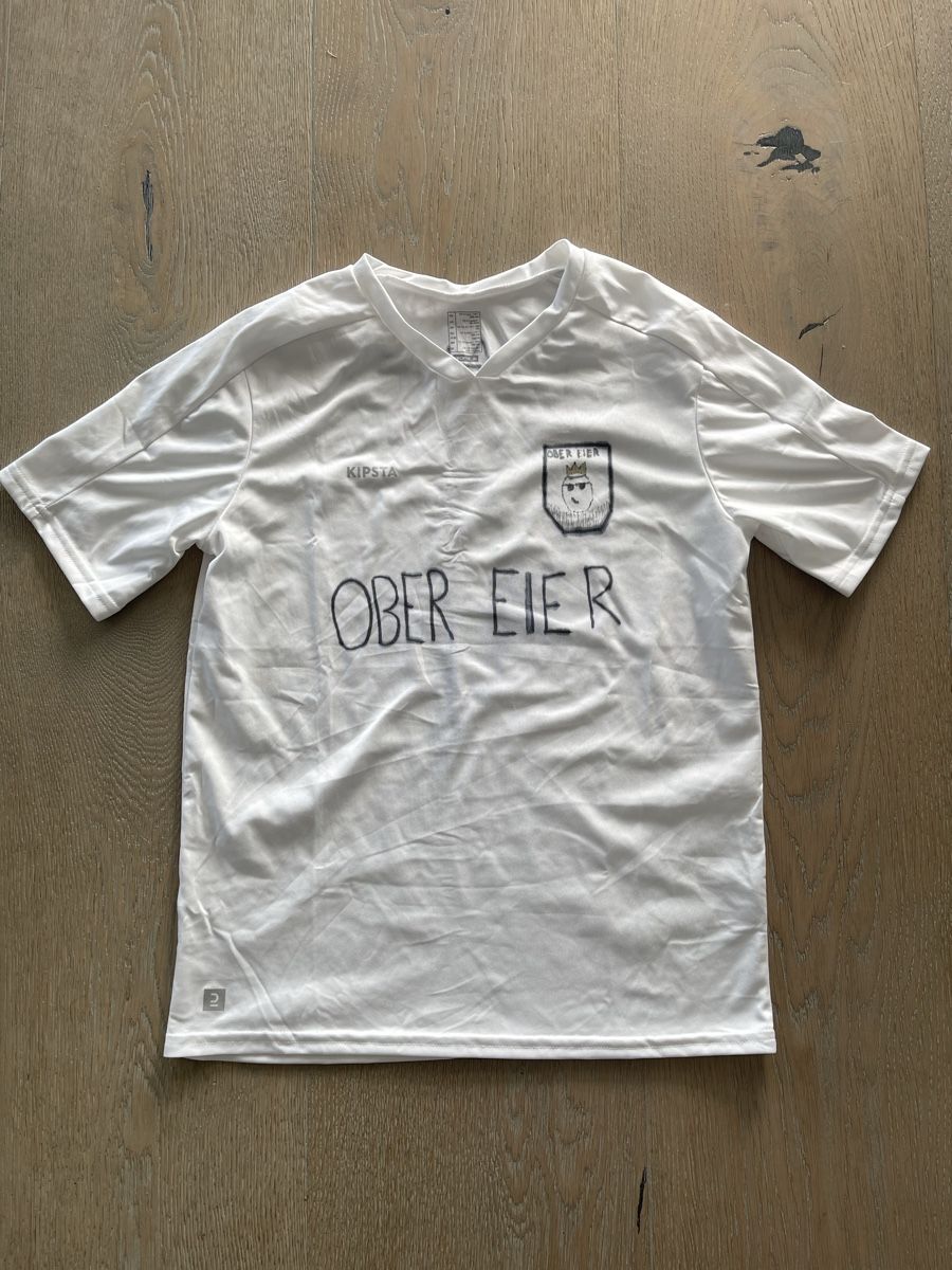 Scarpe, pantaloni & magliette da ginnastica: Fussballtrikot "Ober Eier" Grösse 152/158 – Usato da Meilen venduto da Golfer04 1
