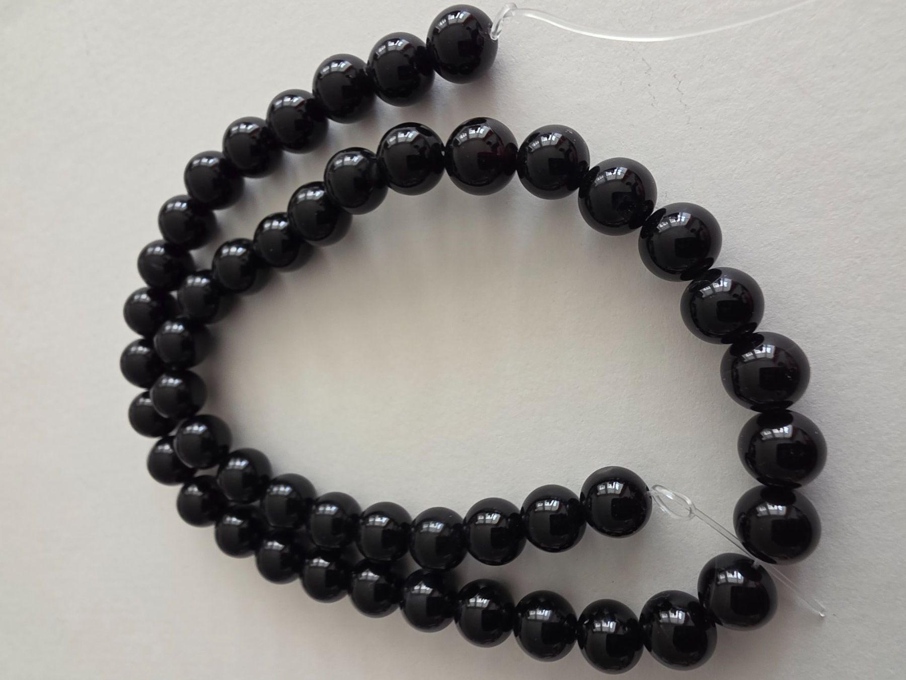 Minerali & Pietre curative: Onyx schwarz 8mm. Strang – Nuovo e nell'imballaggio originale da Menziken venduto da Mirager