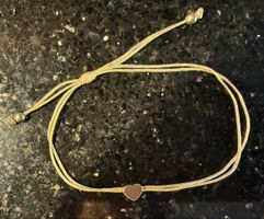 Armband, verstellbar, mit goldfarbenem Herzchen
