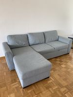 Blau-graues Sofa mit Schlaffunktion und Stauraum