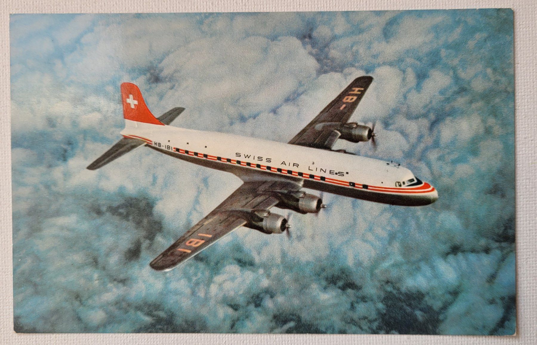 Cartoline postali: TRANSATLANTIC DC-6 B – Nuovo (secondo la descrizione) da Neftenbach venduto da Mador6