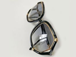 Sonnenbrille TED LAPIDUS France schwarz mit gold 1980s