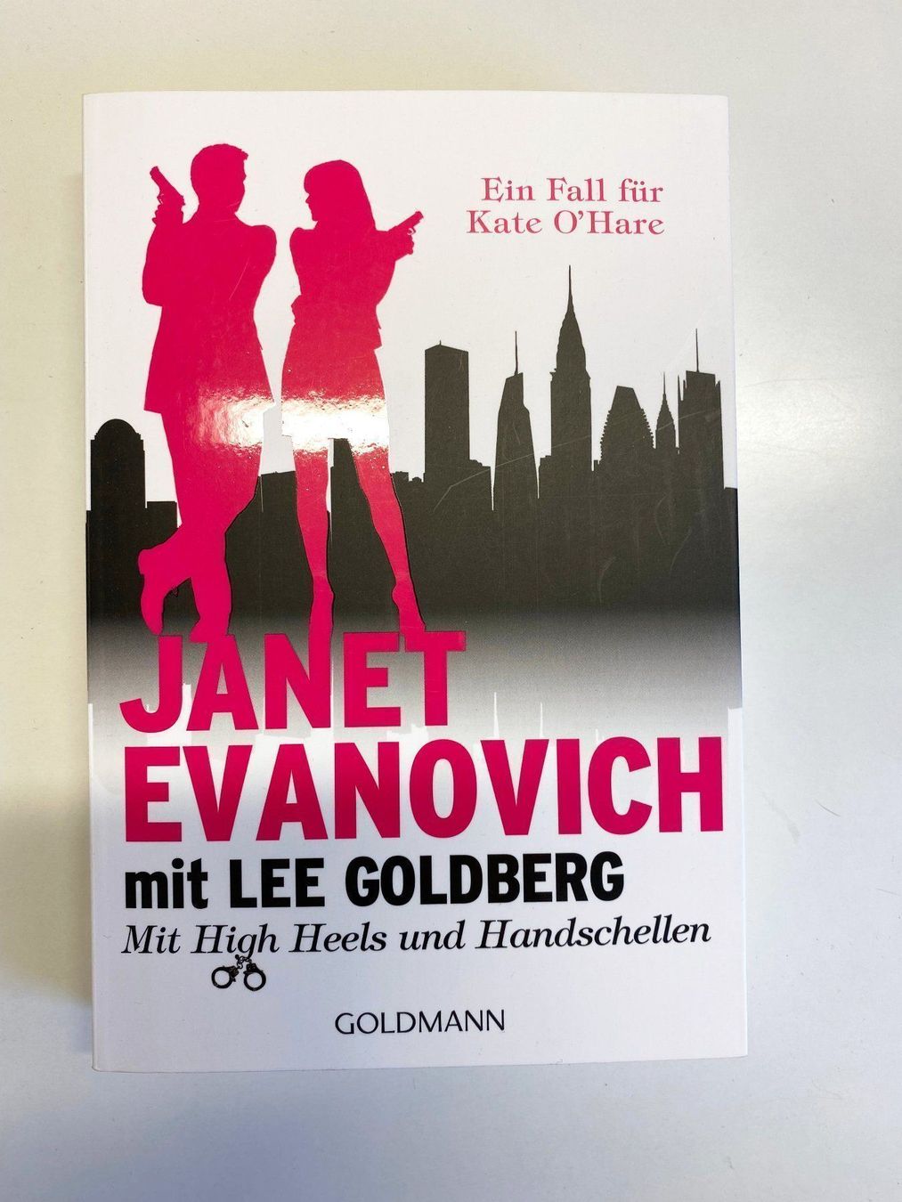 Bücher: Mit High Heels und Handschellen - Janet Evanovich – Neu und originalverpackt aus Eschenbach SG von Sums