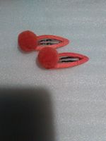 HAARKLIPS;MIT EINE KÜGEL UND STOFF