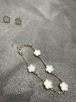 Schmuckset: Halskette, Ohrringe und Armband mit Glücksklee