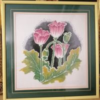Gesticktes Bild blühender Mohn