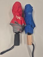 2 Regenschirme "Mobiliar und Roche"