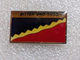Ansteckpin 220: Bitter und süss