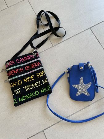1 Umhängetaschen schwarz & Handtasche in blau im Set