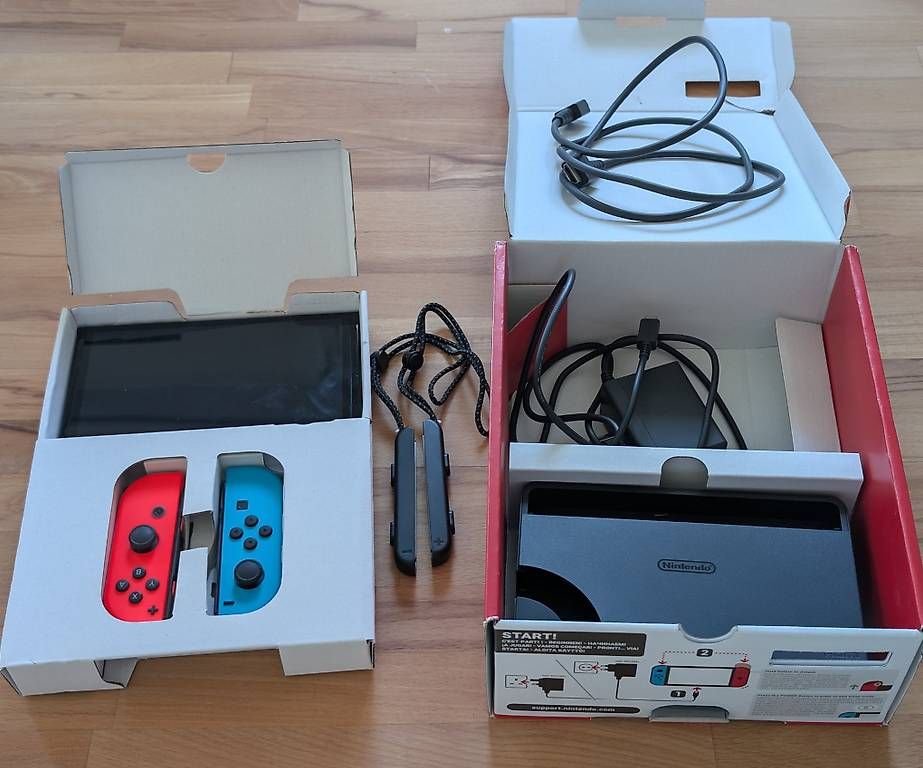 Nintendo Konsolen: Nintendo Switch OLED - mit Garantie + Ringfit Adventure – Gebraucht aus Aarau von Lepto 1