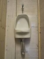 Urinal Ceramic White with flush valve and hose, used