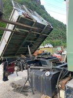 Unimog Dreiseitenkipper mit Krankonsol