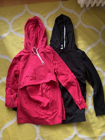 Zwei Still-Hoodies, pink und schwarz