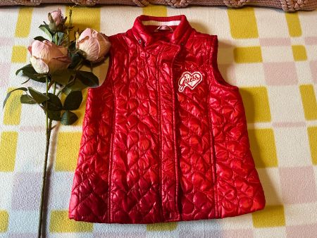 Red sleeveless gilet from Guess with heart motif age 5/110cm