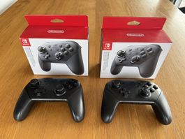 2 Nintendo Switch Pro Controller + boîtes