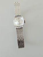 petite montre JAEGER LECOULTRE mécanique or 18k et diamants