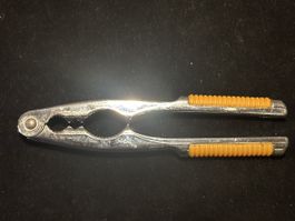 Nussknacker Metall orange Handgriffe, Advent Deko Nusszange